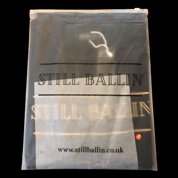 Still Ballin' Signature T-shirt Black with Gold print packaging